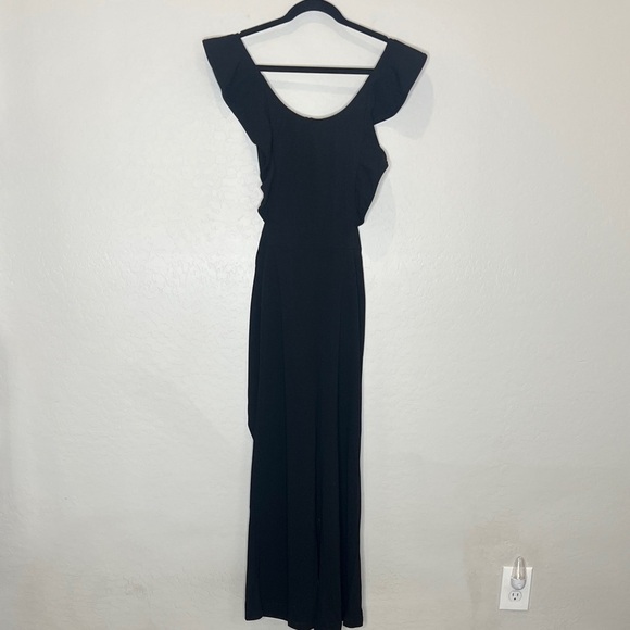 Hello Molly Pants - Hello Molly Black Flutter Sleeve Jumpsuit with tie and cutting back Small